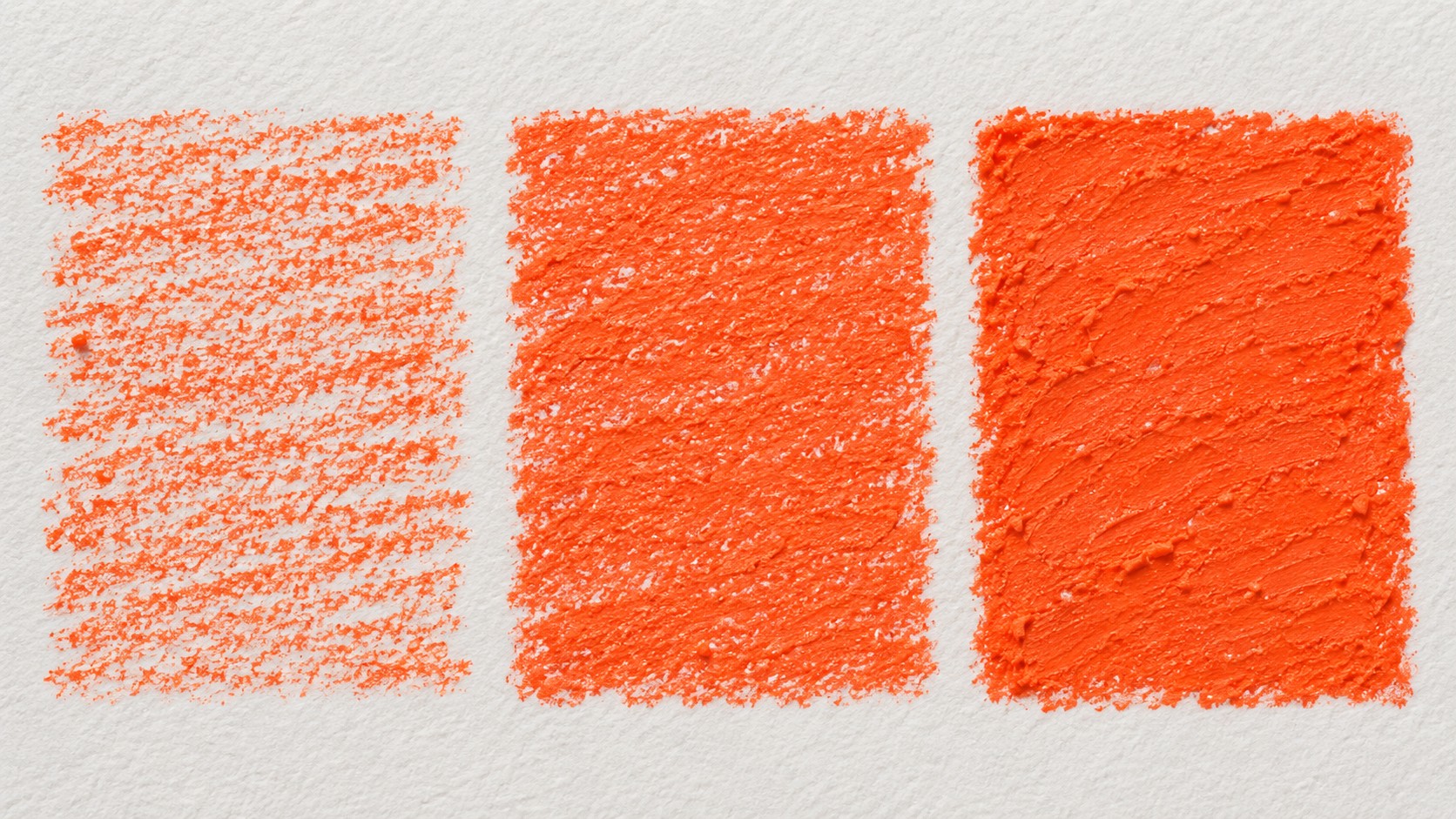 Illustration of three orange oil pastel swatches on one textured sheet, showing light, moderate and broad-contact coverage